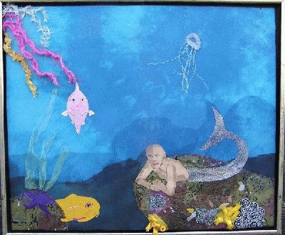 Fabric picture, The  merman in the coralreef, 60 cm x 50 cm, er i svæveramme, kr. 6000,-,  Kirsten Venø tilsalg i Galleri Art Danish